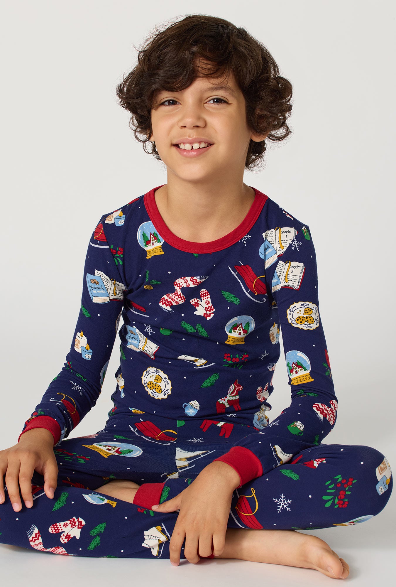 A boy wearing Nordic Nights Long Sleeve Stretch Jersey Kids Pj Set closer look