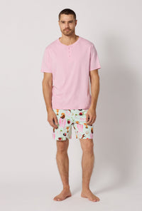 A man wearing Green and  Pink Men's Short Sleeve Henley Stretch Jersey Short Pj Set front view