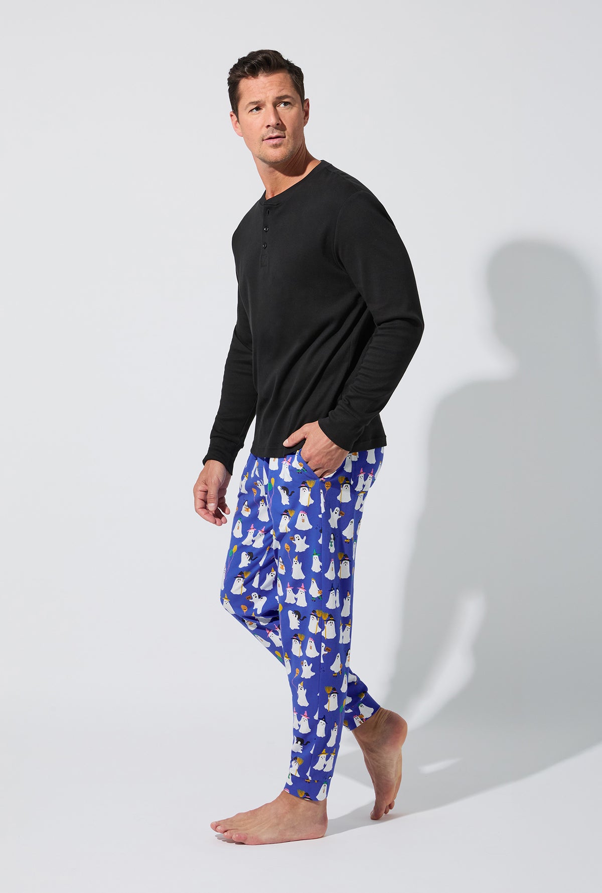 A man wearing That&#39;s The Spirit Men&#39;s Long Sleeve Henley and Jogger Stretch Jersey PJ Set