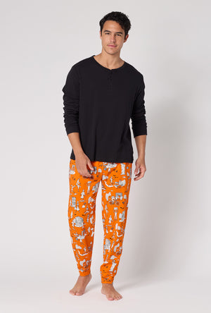 A Man Wearing Orange Spooky In The City Men's Long Sleeve Henley And Jogger Stretch Jersey Pj Set