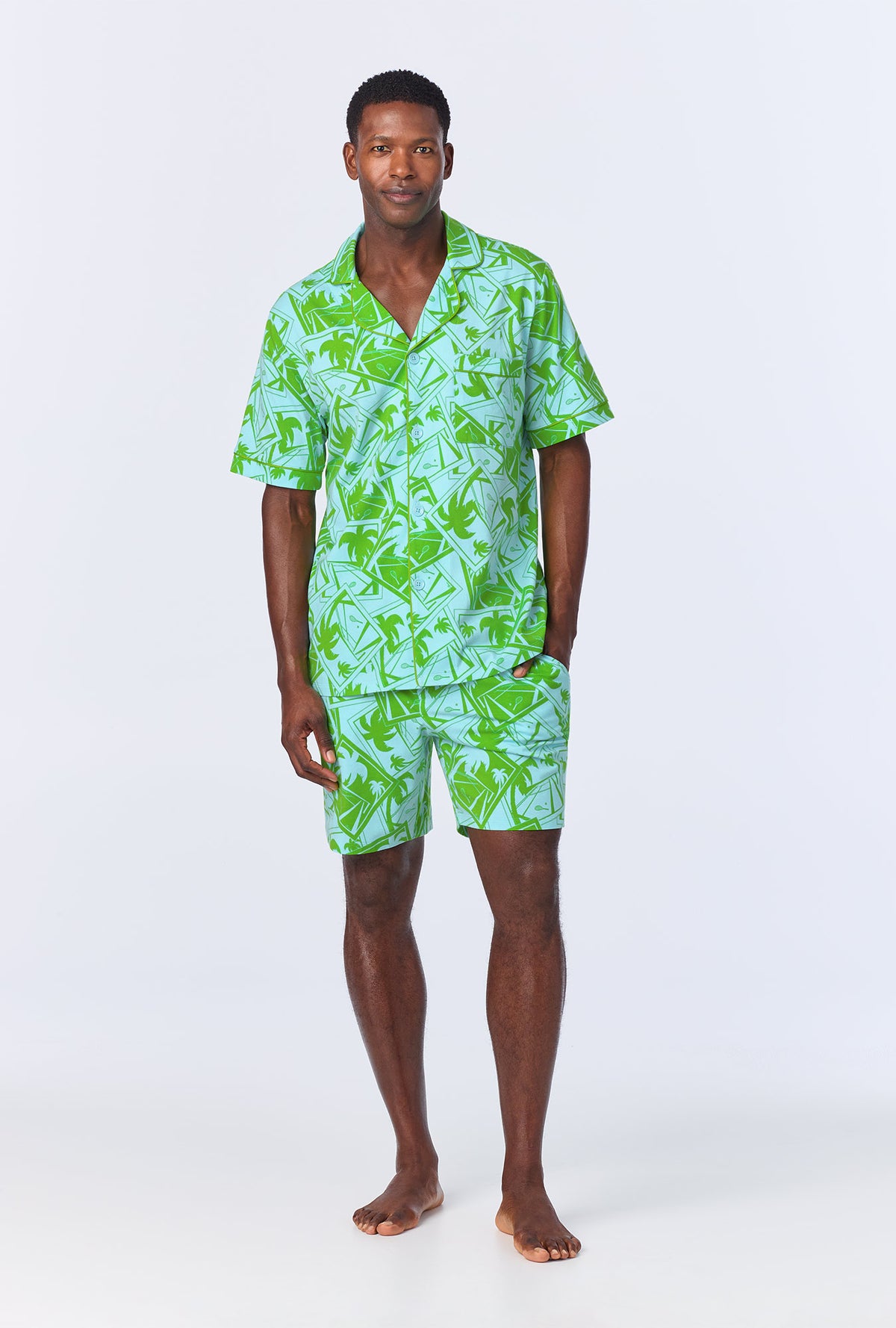 A man wearing BedHead x Mr. Turk Blue Tennis Court Men&#39;s Short Sleeve Notch Stretch Jersey Short PJ Set