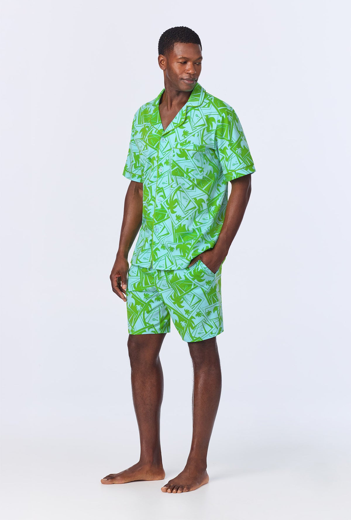 A man wearing BedHead x Mr. Turk Blue Tennis Court Men&#39;s Short Sleeve Notch Stretch Jersey Short PJ Set