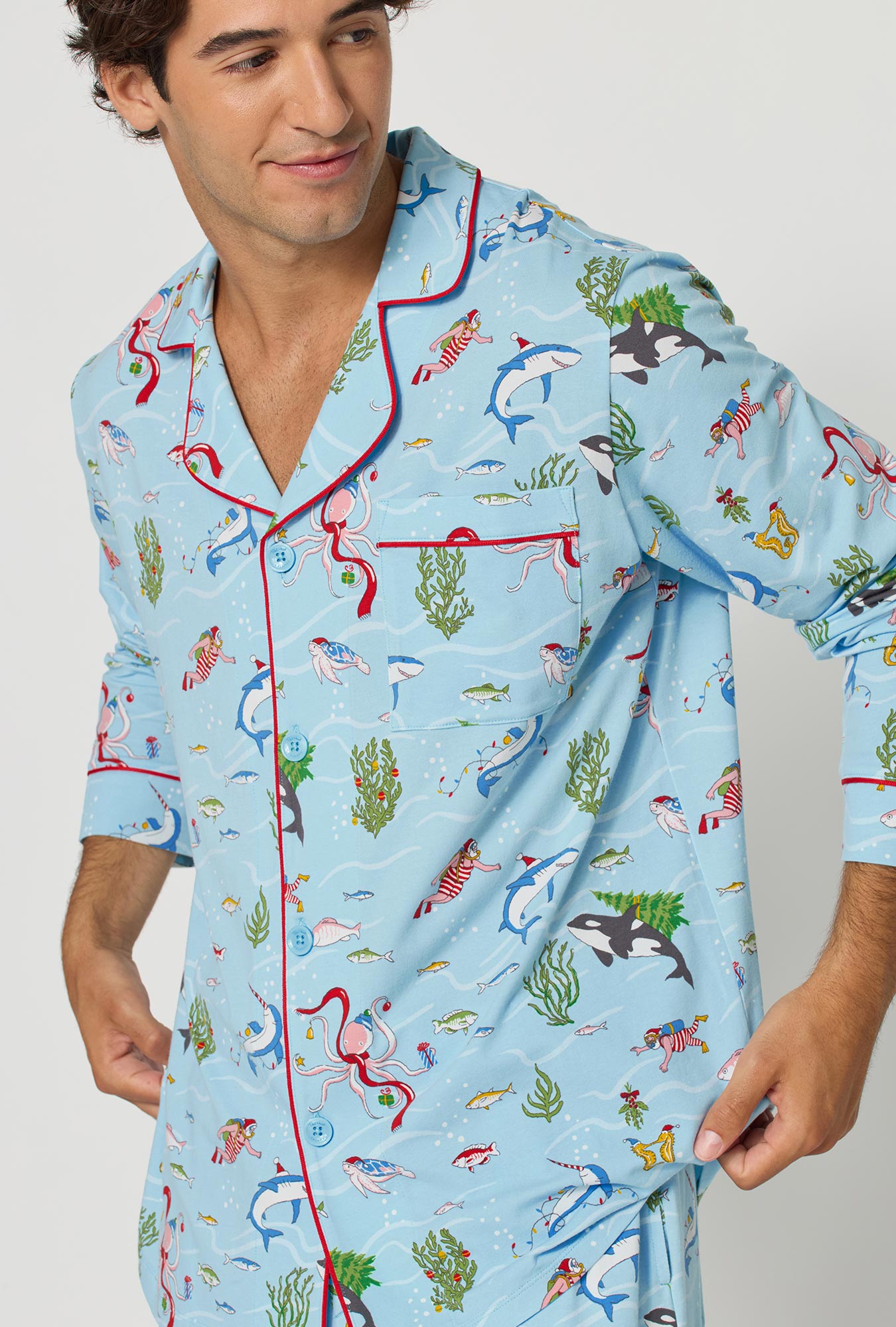 A man wearing Jingle All The Wave Men's Long Sleeve Classic Stretch Jersey Pj Set closer look