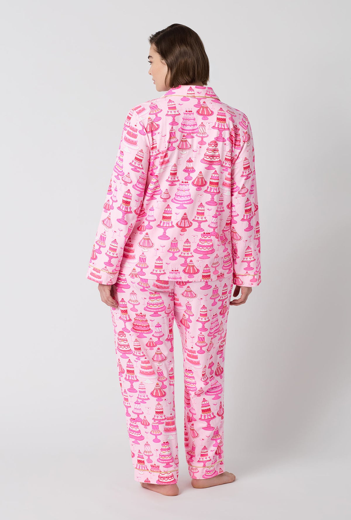 A Lady Wearing Plus Size Cake Shop Long Sleeve Classic Stretch Jersey Pj Set in a back view look