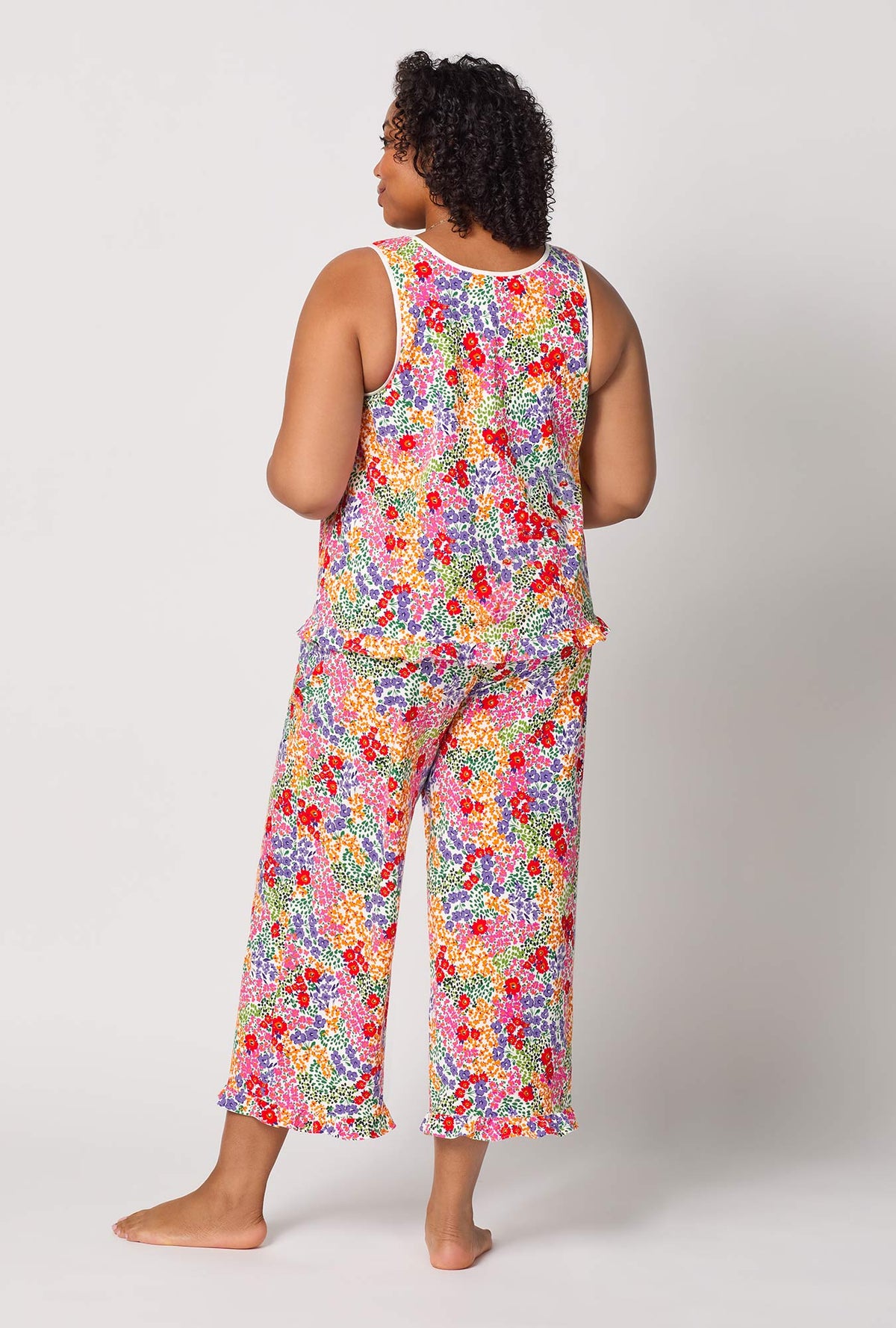 A lady wearing plus size Spring Fields Ruffle Tank Stretch Jersey Cropped Pj Set