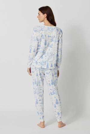 A lady wearing Winter Wonderland Long Sleeve Pullover Crew And Jogger Stretch Jersey Pj Set back view