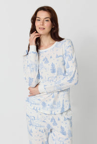 A lady wearing Winter Wonderland Long Sleeve Pullover Crew And Jogger Stretch Jersey Pj Set closer look
