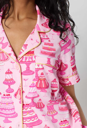 A Lady Wearing Cake Shop Short Sleeve Classic Shorty Stretch Jersey Pj Set posing with a detail view  close up shot