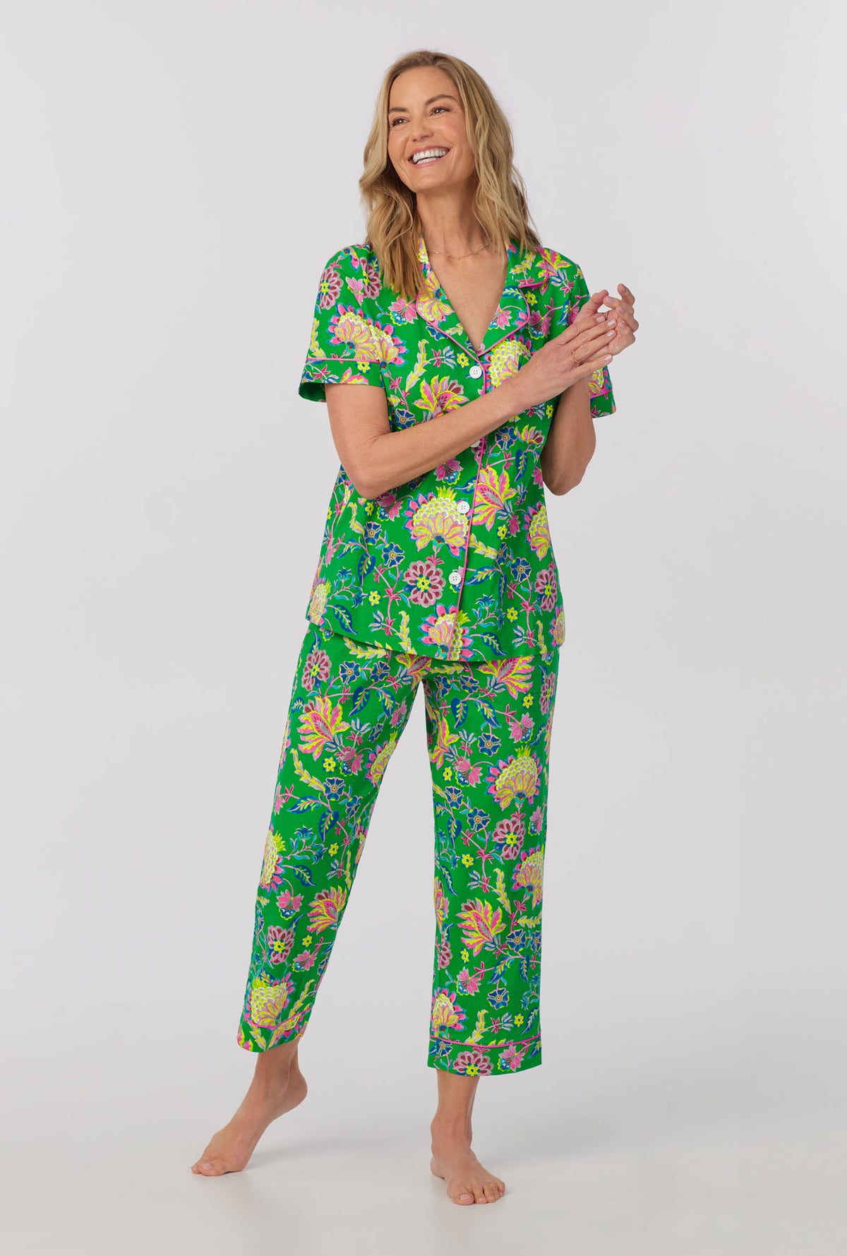 A lady wearing Short Sleeve Classic Stretch Jersey Cropped PJ Set with royal garden print