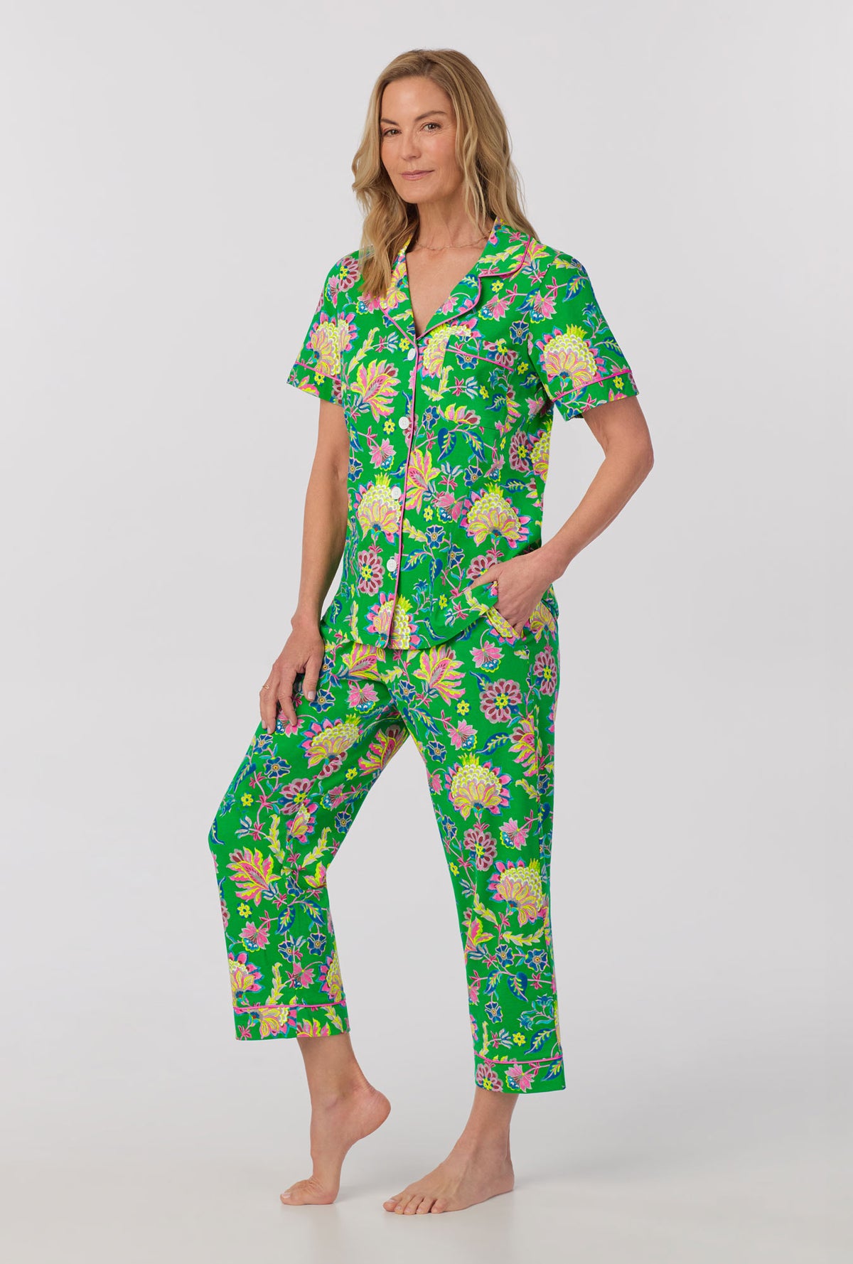 A lady wearing Short Sleeve Classic Stretch Jersey Cropped PJ Set with royal garden print