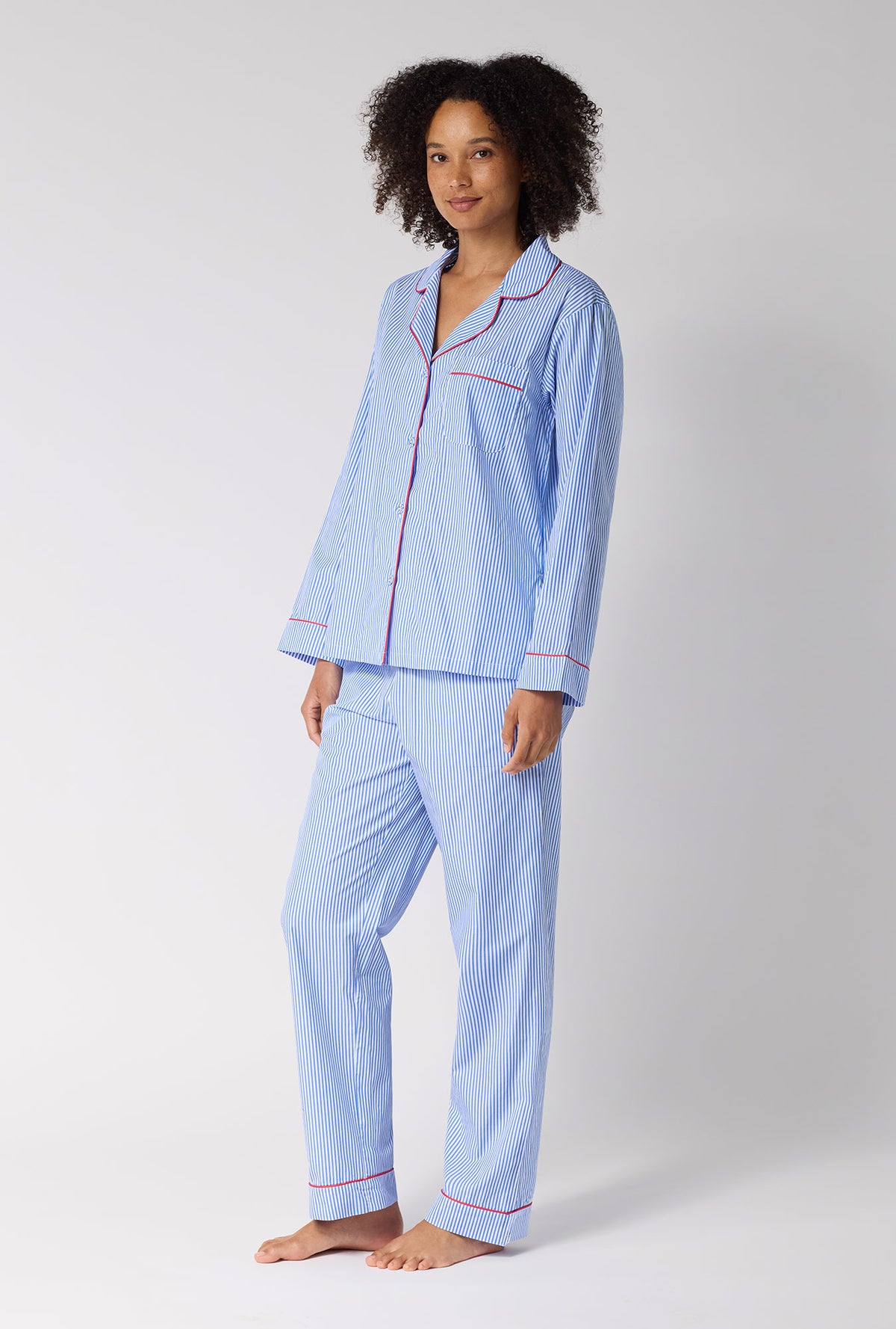 A Lady Wearing French Stripe Long Sleeve Classic Woven Supersoft Cotton Poplin Pj Set in a side angled pose