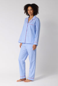 A Lady Wearing French Stripe Long Sleeve Classic Woven Supersoft Cotton Poplin Pj Set in a side angled pose