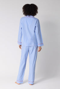 A Lady Wearing French Stripe Long Sleeve Classic Woven Supersoft Cotton Poplin Pj Set in a back view pose