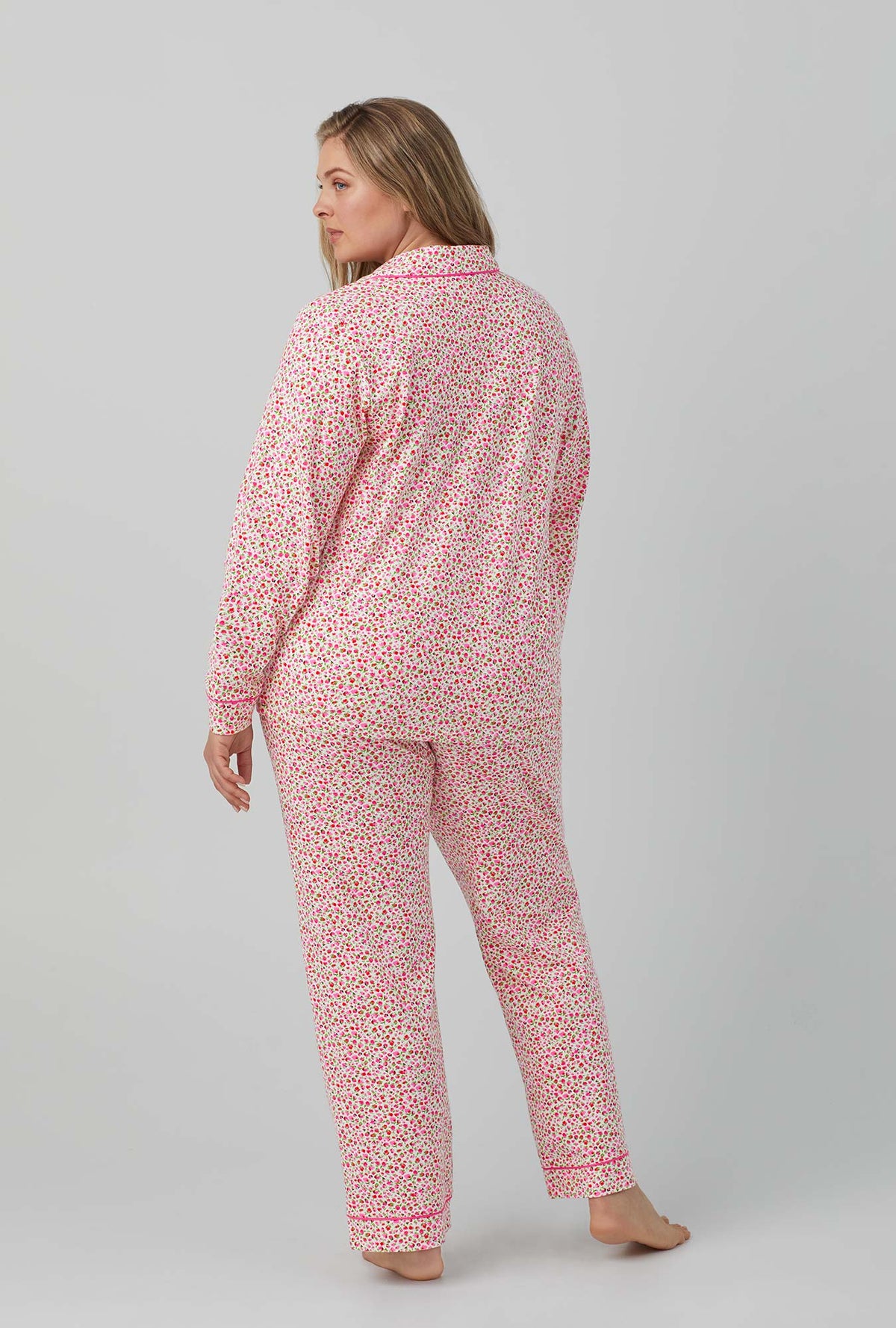 A lady wearing pink Long Sleeve Classic Stretch Jersey PJ Set with Lynn print