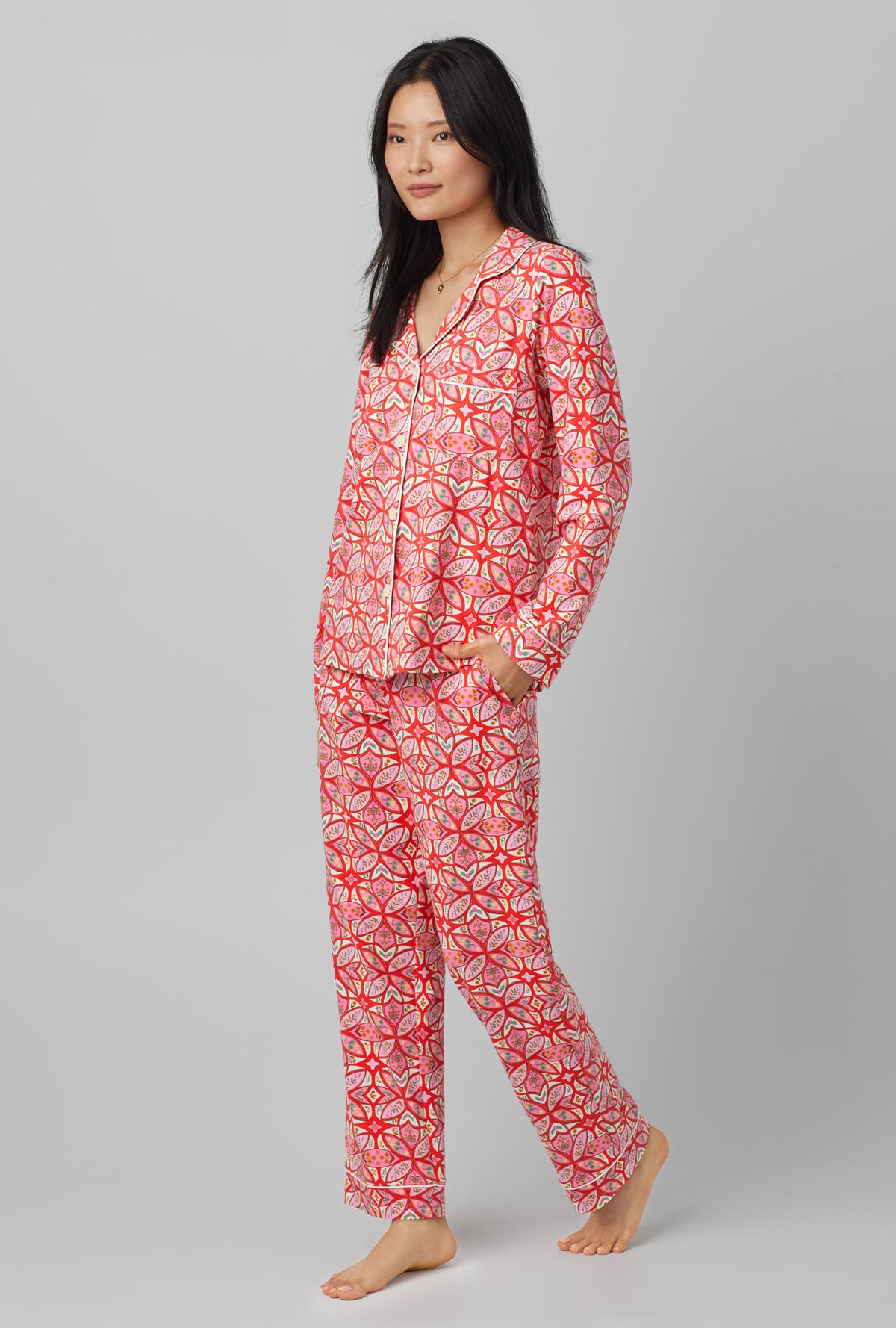 A lady wearing red Long Sleeve Classic Stretch Jersey PJ Set with Prairie Dawn print