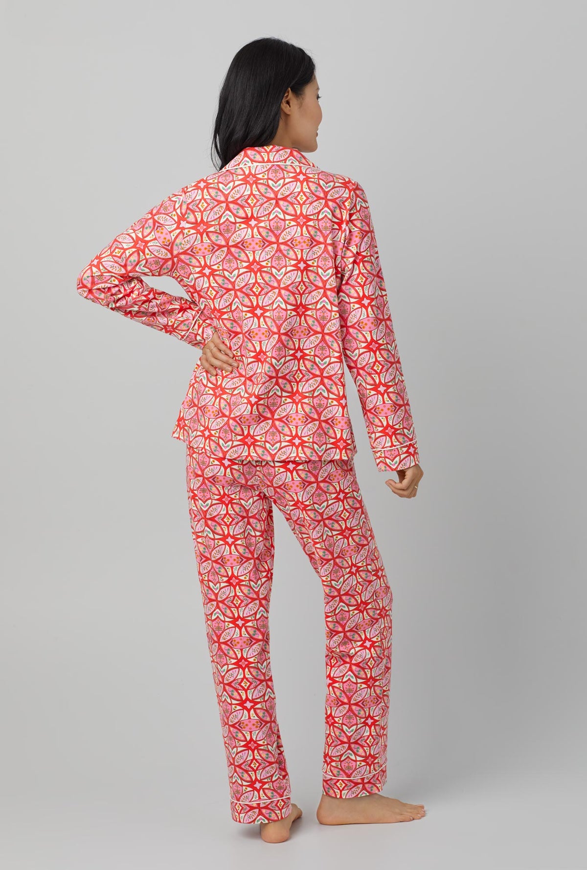 A lady wearing red Long Sleeve Classic Stretch Jersey PJ Set with Prairie Dawn print