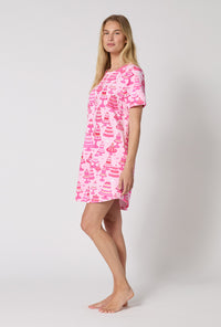 A Lady Wearing Cake Shop Stretch Jersey T-shirt Sleep Dress in a side pose