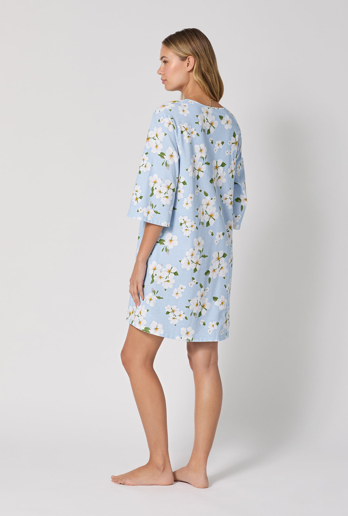 A lady wearing Magnolia Breeze Stretch Jersey Sleep Dress