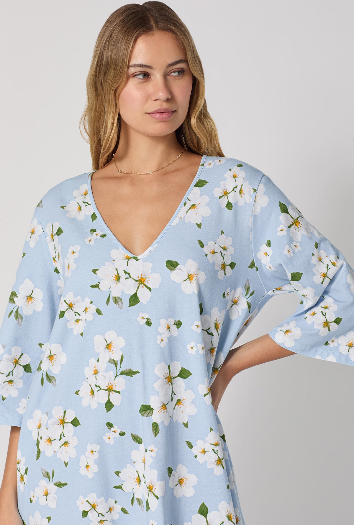 A lady wearing Magnolia Breeze Stretch Jersey Sleep Dress