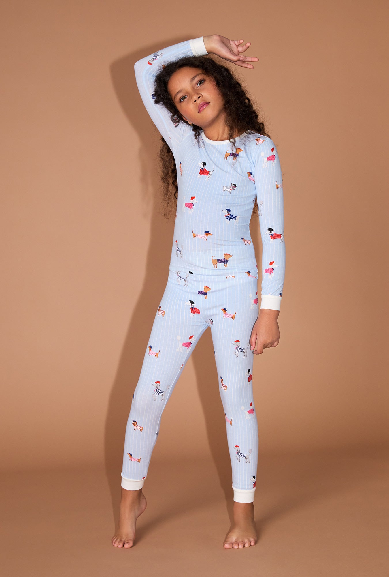 A girl wearing French Pups Long Sleeve Stretch Jersey Kids PJ Set