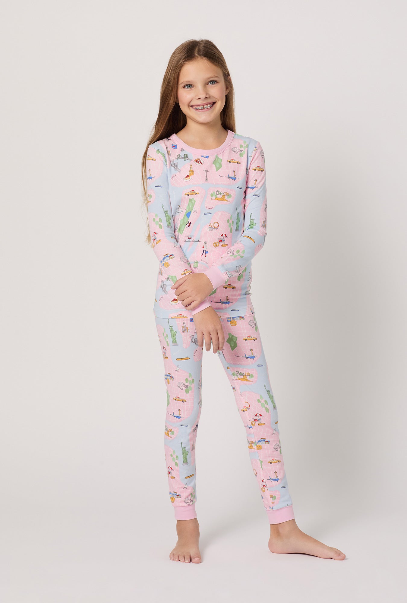 A girl wearing New York, New York Long Sleeve Stretch Jersey Kids Pj Set