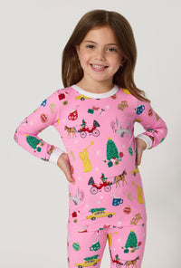 A girl wearing Holiday On Fifth Long Sleeve Stretch Jersey Kids Pj Set closer lool