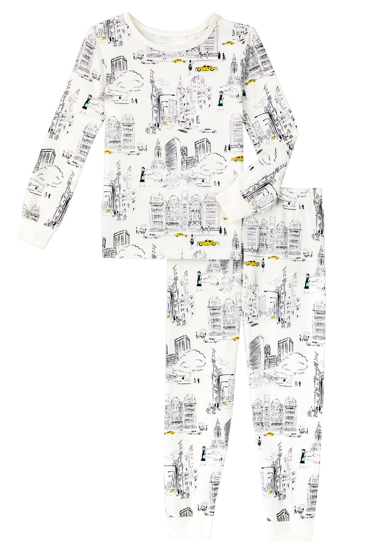 A kid wearing whiite long sleeve stretch jersey kids pj set with city that never sleeps print.