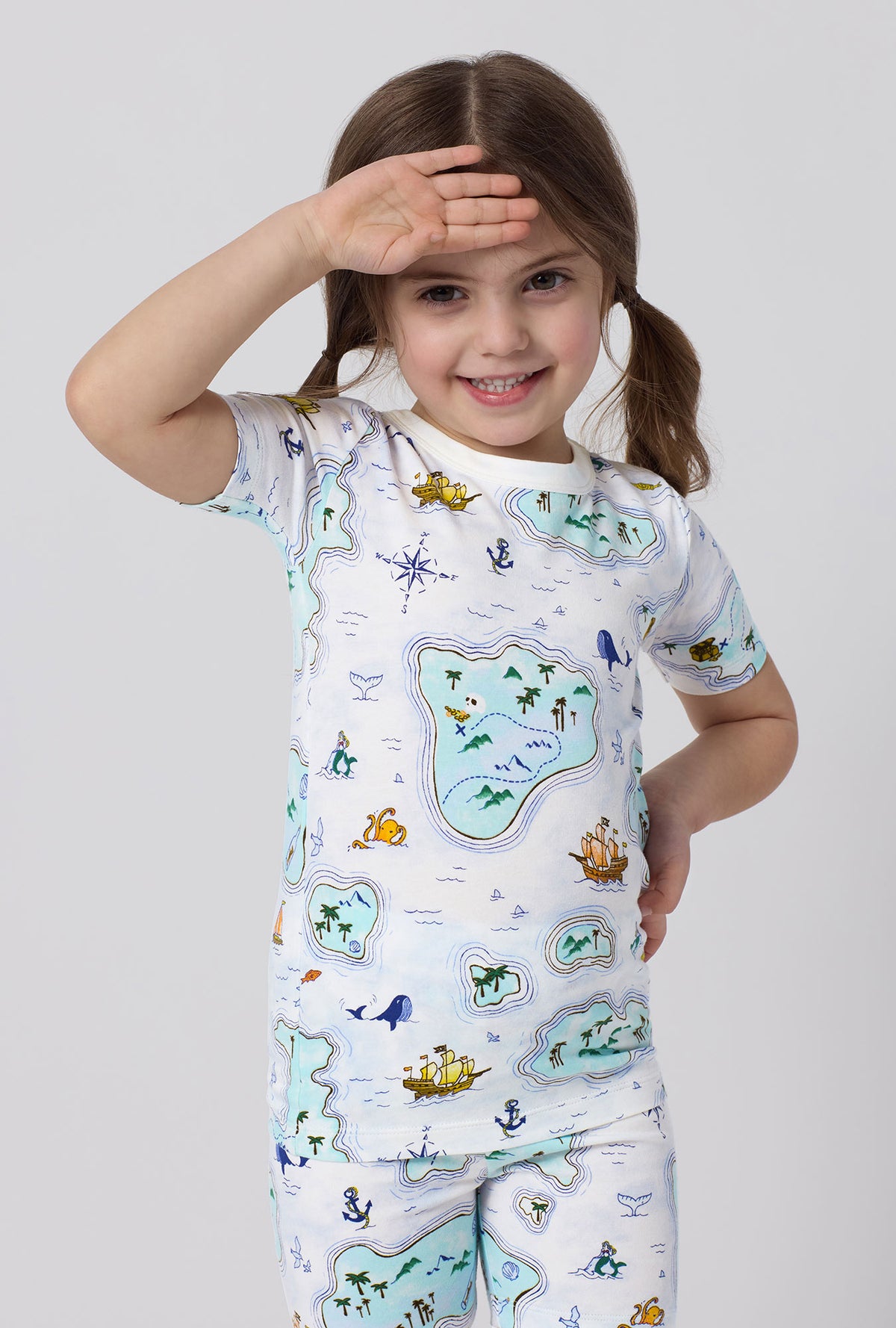 A little girl wearing Treasure Hunt Short Sleeve Stretch Jersey Kids Short Pj Set closer look