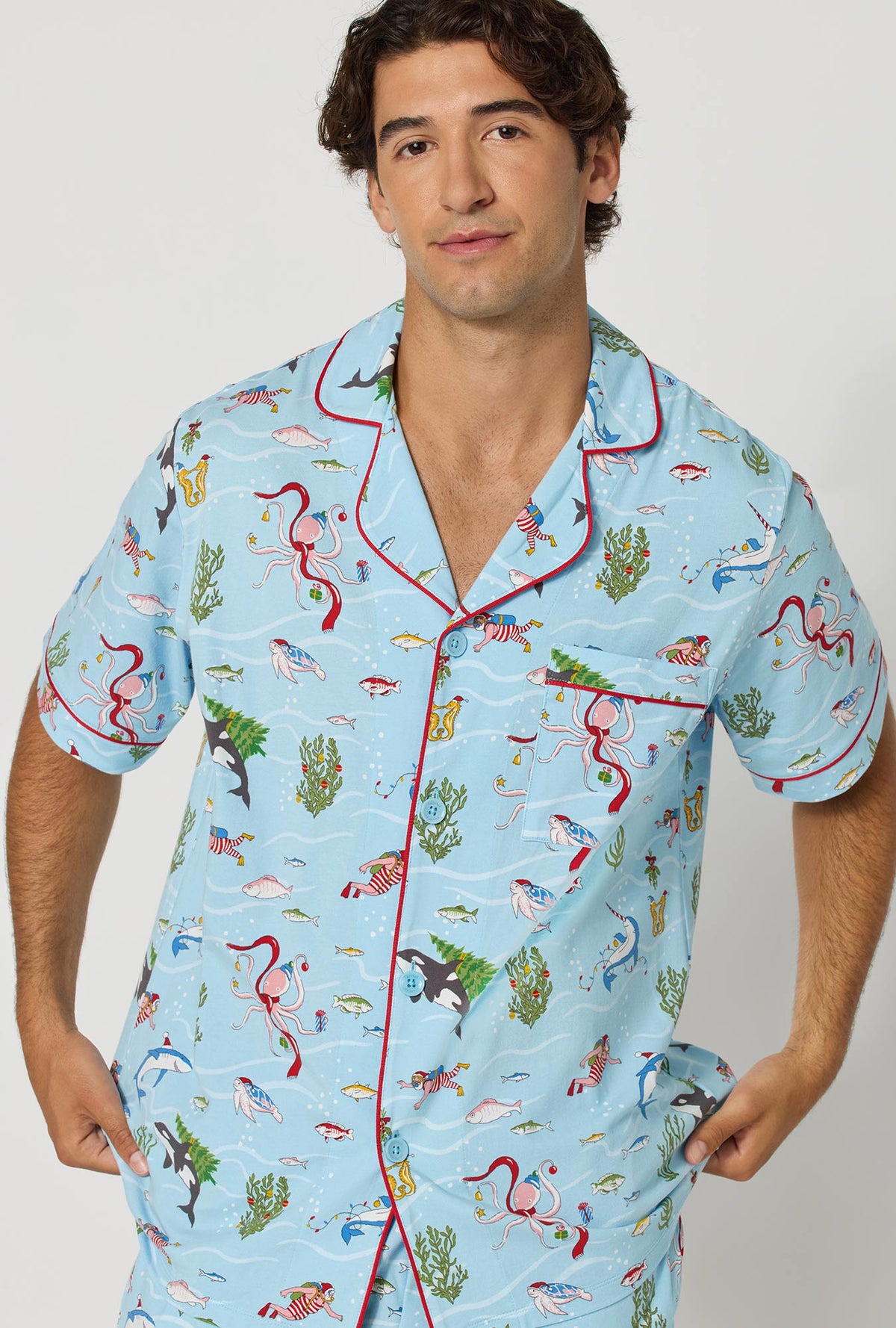 A man wearing Jingle All The Wave Men's Short Sleeve Classic Stretch Jersey Short Pj Set closer look