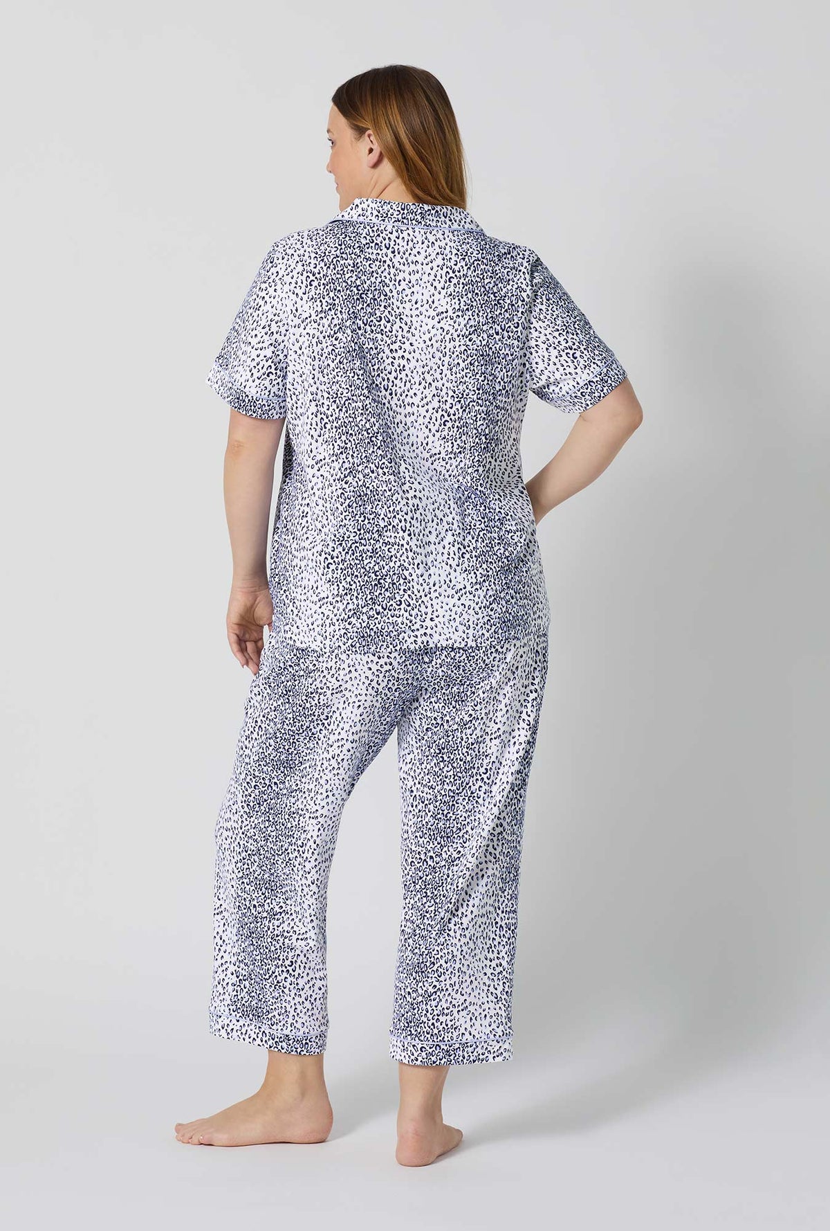 A lady wearing plus size Sea Kitten Short Sleeve Classic Stretch Jersey Cropped Pj Set back view
