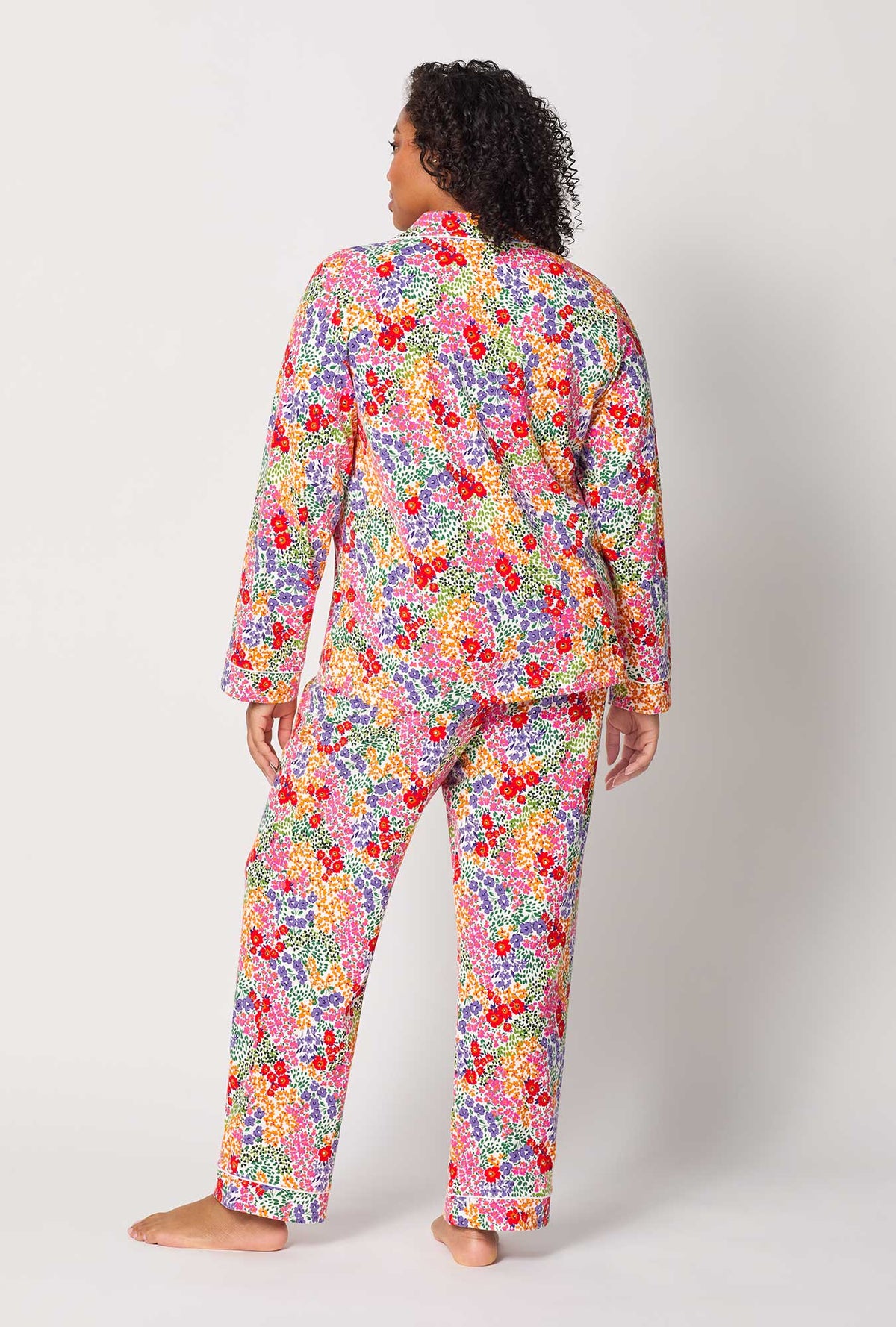 A lady wearing plus size Spring Fields Long Sleeve Classic Stretch Jersey Pj Set
