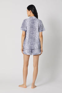 A lady wearing Sea Kitten Short Sleeve Classic Shorty Stretch Jersey Pj Set back view