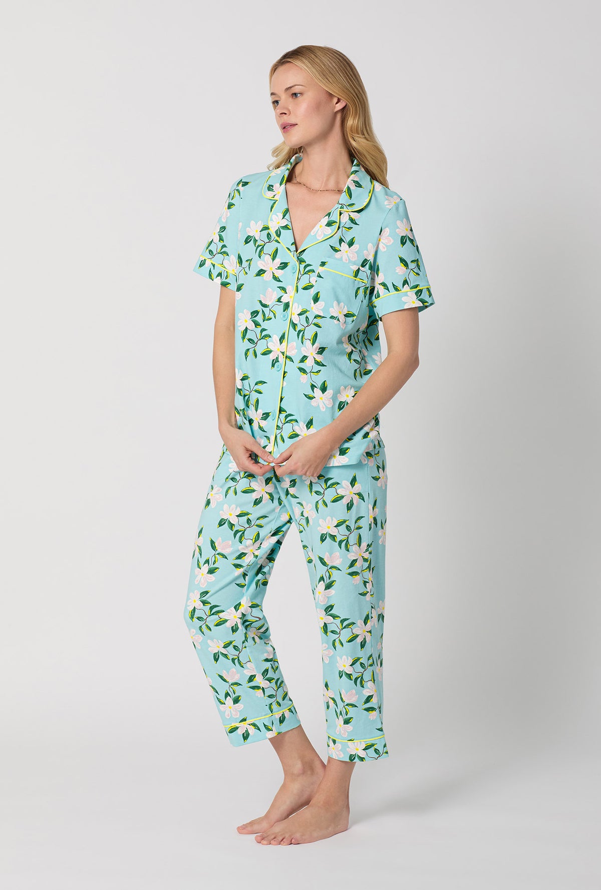 A Lady Wearing Short Sleeve Classic Stretch Jersey Cropped PJ Set with Belle Blossoms Print Side Angle View