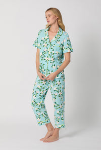 A Lady Wearing Short Sleeve Classic Stretch Jersey Cropped PJ Set with Belle Blossoms Print Side Angle View