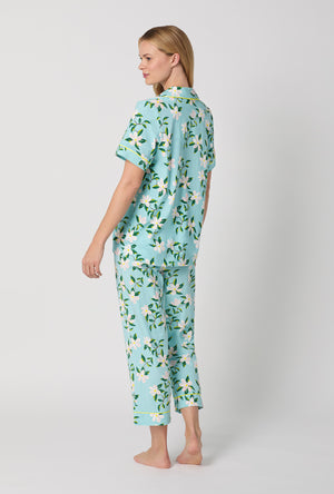 A Lady Wearing Short Sleeve Classic Stretch Jersey Cropped PJ Set with Belle Blossoms Print Side Angle Back View