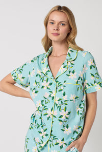 A Lady Wearing Short Sleeve Classic Stretch Jersey Cropped PJ Set with Belle Blossoms Print Closeup View