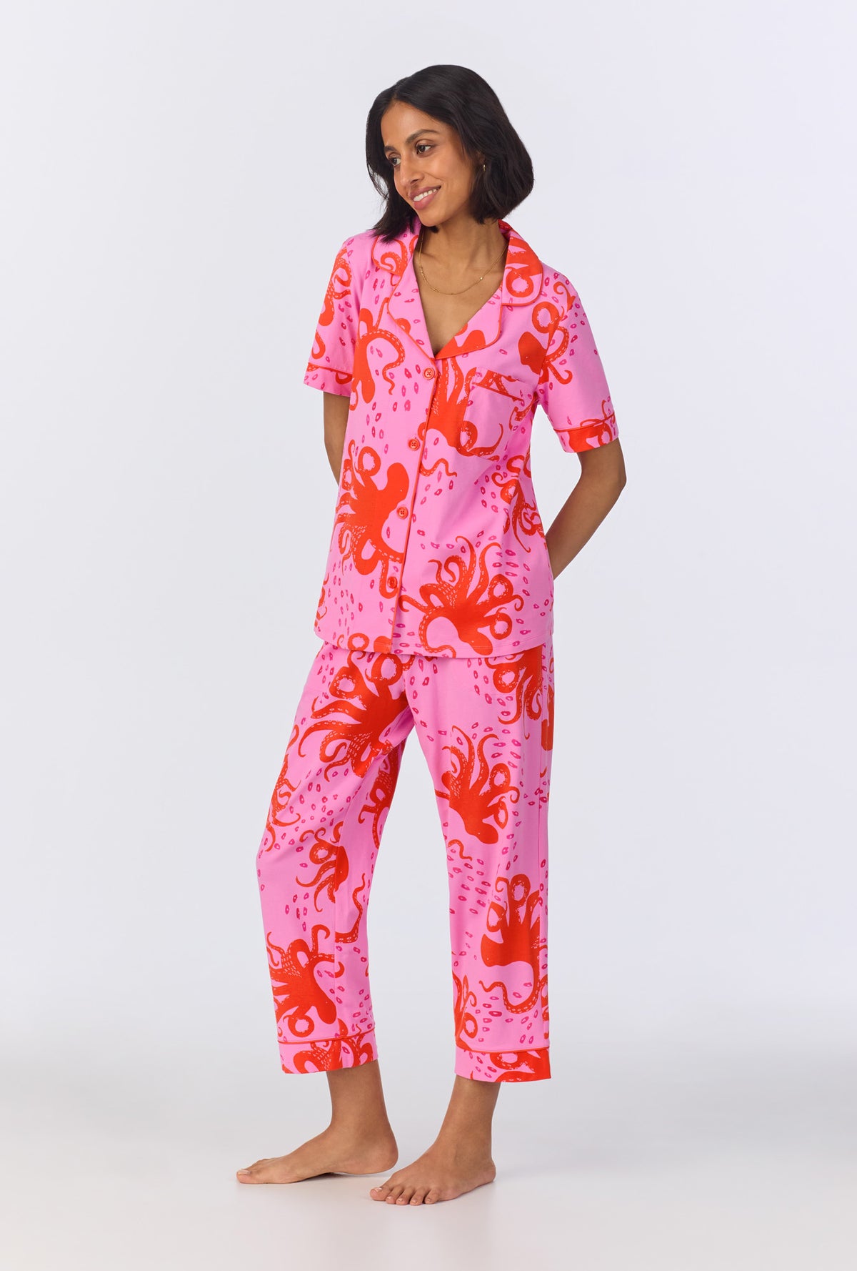 A lady wearing Sea Dreamers Short Sleeve Classic Stretch Jersey Cropped PJ Set