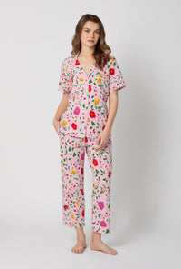 A lady wearing Sunlit Floral Short Sleeve Classic Stretch Jersey Cropped Pj Set