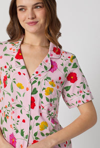 A lady wearing Sunlit Floral Short Sleeve Classic Stretch Jersey Cropped Pj Set
