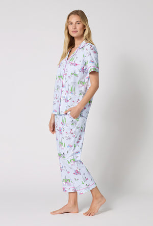 A Lady Wearing Belle Vie Short Sleeve Classic Stretch Jersey Cropped Pj Set facing front in a side angled pose