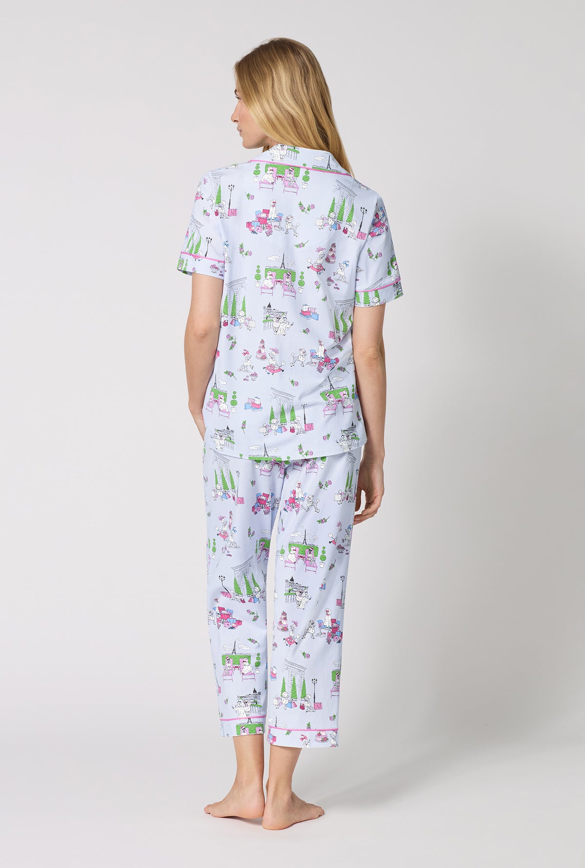 A Lady Wearing Belle Vie Short Sleeve Classic Stretch Jersey Cropped Pj Set turned back while looking to the side