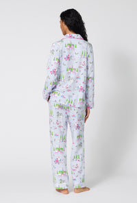 A Lady Wearing Belle Vie Long Sleeve Classic Stretch Jersey Pj Set facing back in a full standing pose