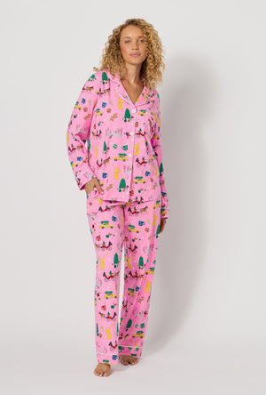 A lady wearing Holiday On Fifth Long Sleeve Classic Stretch Jersey Pj Set