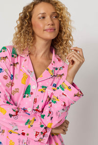 A lady wearing Holiday On Fifth Long Sleeve Classic Stretch Jersey Pj Set closer look