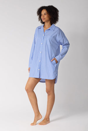 A Lady Wearing French Stripe High Low Woven Supersoft Cotton Poplin Boyfriend Shirt in a side angled pose