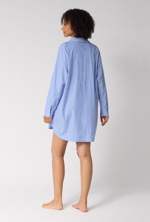 A Lady Wearing French Stripe High Low Woven Supersoft Cotton Poplin Boyfriend Shirt in a back view pose