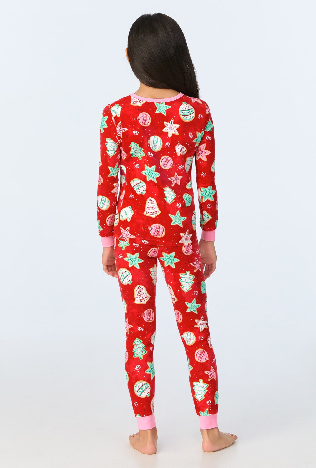 A child wearing Sugar Cookies Long Sleeve Stretch Jersey Kids PJ Set