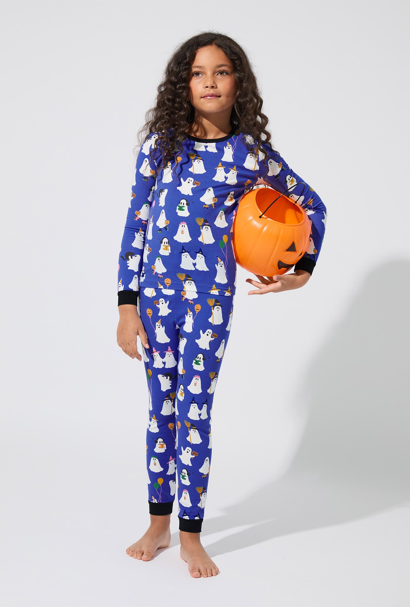 A girl wearing That’s The Spirit Long Sleeve Stretch Jersey Kids PJ Set