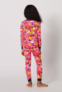 A Girl Wearing Pumpkin Patch Party Long Sleeve Stretch Jersey Kids Pj Set in a back view pose