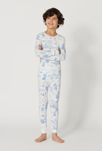 A boy wearing Winter Wonderland Long Sleeve Stretch Jersey Kids Pj Set